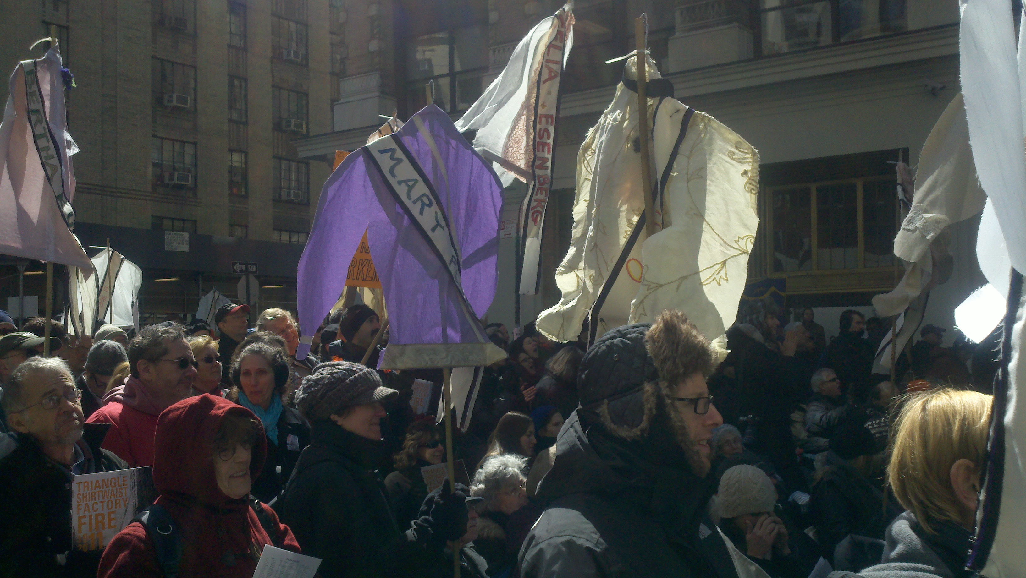 Marchers commemorated the 100th anniversary of the Triangle Shirtwaist Factory Fire 