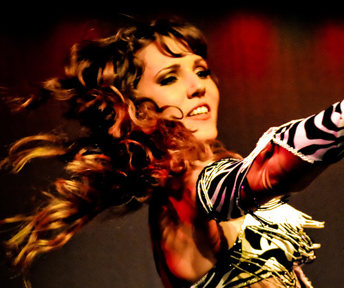 "The beautiful belly dancer spins," by tibchris/flickr.