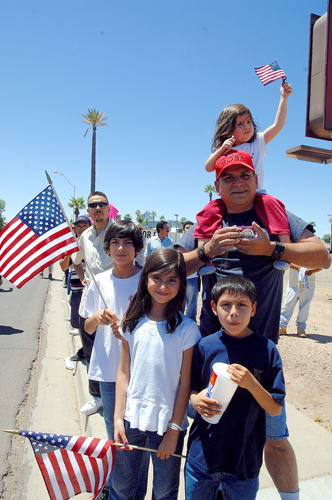A family at Saturday's protest in Phoenix - Photo: José Muño