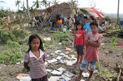 Gelian dela Cruz (11) is worried that her school is ruined. She was even excited to do an oral recitation the day when the storm struck their town in Barangay Libertad, Bogo City, Cebu. The full scale of the disaster caused by Typhoon Haiyan in the Philippines is only now becoming apparent. (Photo: Flicker/Pio Arce/Genesis Photos - World Vision)
