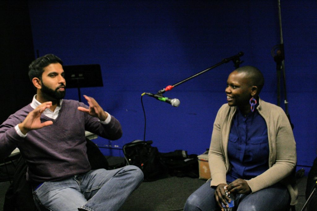 Peter Jacob makes a point as Agunda Okeyo looks on during the podcast recording at The New School. Photo: Stephanie Rodriguez